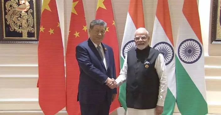 Xi, Modi conduct in-depth exchange of views, agree China, India should be partners