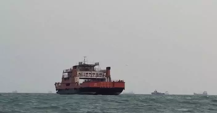Oil tanker towed toward Omani port after being hit in Strait of Hormuz