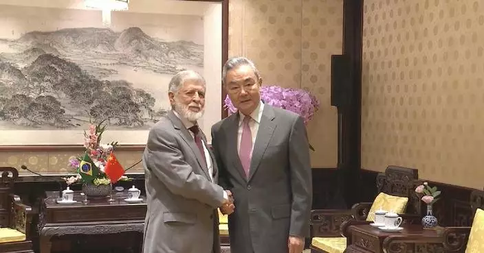 China's top diplomat meets special advisor to Brazilian president