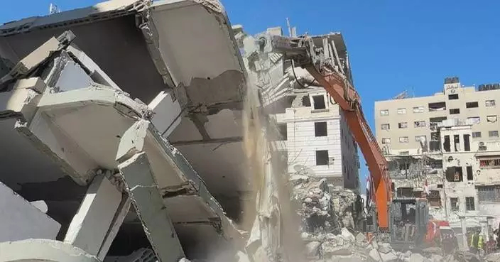 Search, rescue continue after building collapse kills at least 20 in Gaza