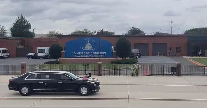 Trump arrives to greet Xi at Joint Base Andrews