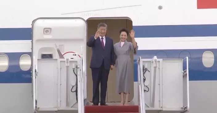 Xi lands in U.S. for state visit, greeted by Trump
