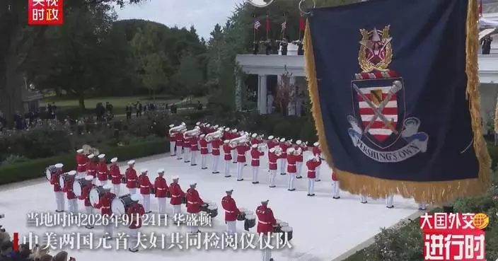 Xi, Trump attend military review at Rose Garden