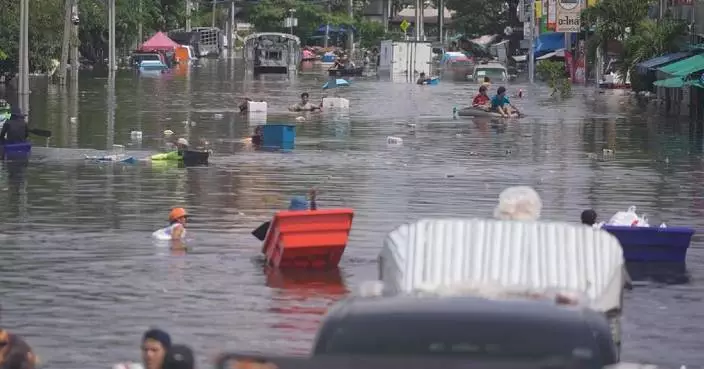 Bangkok suburbs endure daily struggle as floodwaters linger