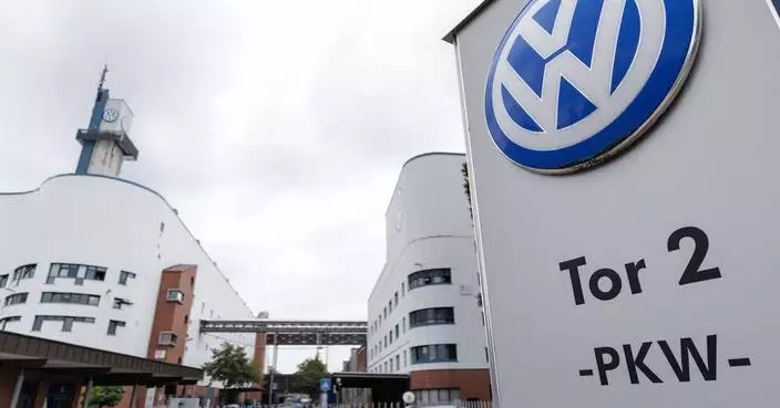 Volkswagen board approves cutting 50,000 more jobs and closing 4 plants