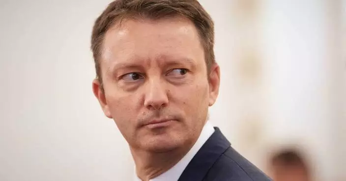 Romania's prime minister-designate teams up with 3 parties in a bid to form cabinet