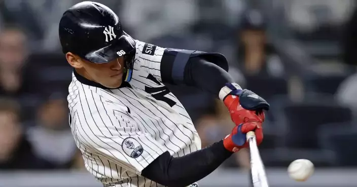 Lombard's incredible slide, tiebreaking homer lift Yanks over Rays. Schlitter finishes with 1.95 ERA