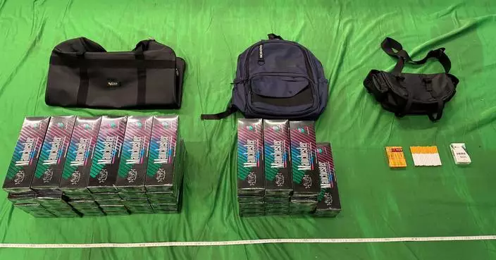 Woman jailed for two months, fined $2,000 for smuggling nearly 10,000 illicit cigarettes into Hong Kong.