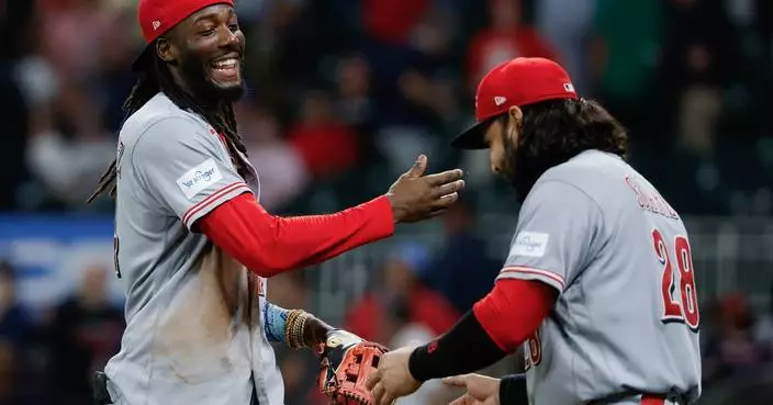 Elly De La Cruz hits 30th homer and Reds rally for 7-6 win over Braves, who lock up NL's No. 3 seed