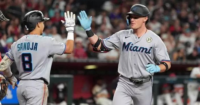 Esteury Ruiz hits 3-run double in 11th to lift Marlins to 4-2 win, damaging D-backs' playoff hopes