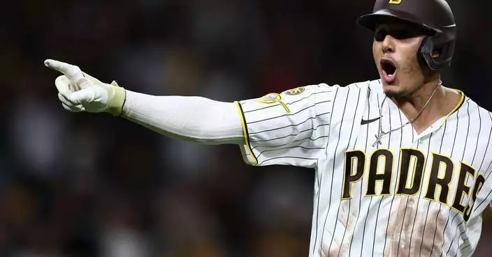 Machado homers as Padres beat D-backs 10-7 to clinch home field in wild-card round vs Cubs