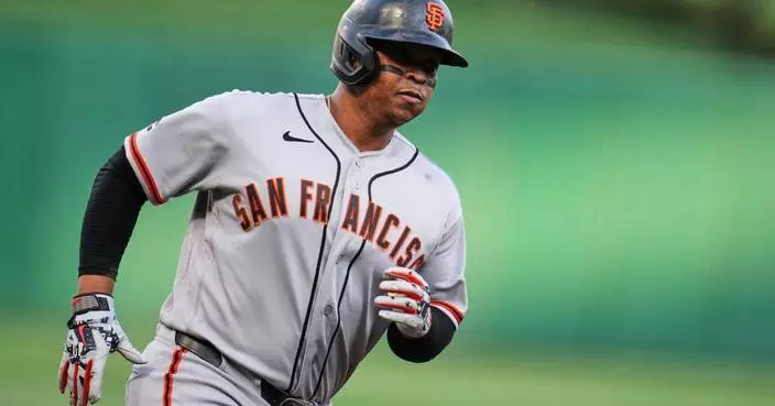 Rafael Devers hits 32nd homer, extends hit streak to 10 games as Giants beat Pirates 5-4 in 10