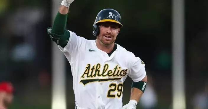 Walton homers and Bolte has 4 hits to lead the Athletics to a 7-3 victory over the Angels