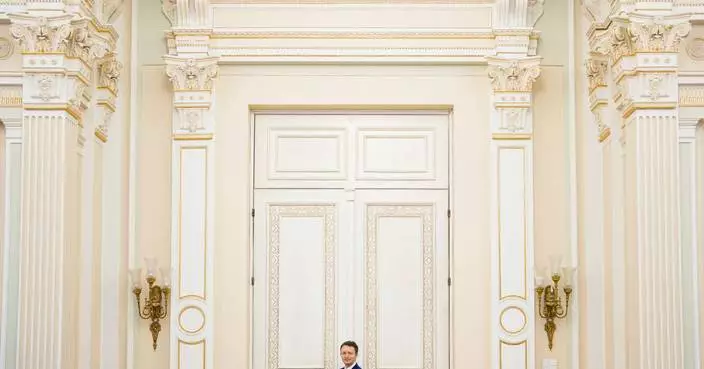 Romanian lawmakers set to vote on new center-right Cabinet as political crisis drags on