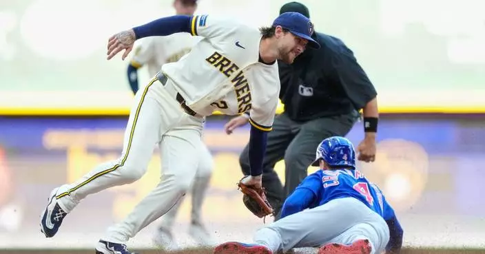 Brewers rally in 8th and hold off comeback attempt in 9th for 4-3 win over Cubs