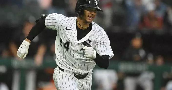 White Sox keep pace in the AL Central with a rain-soaked 8-1 win over the Tigers
