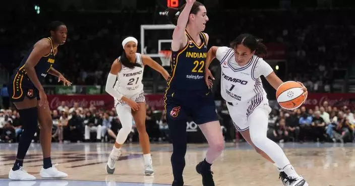 Fever's Mitchell surprised by postgame party after setting WNBA scoring record in win at Toronto