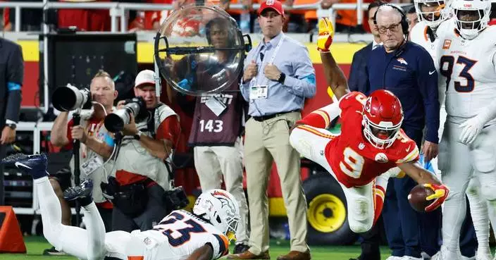A 1930s 'Heisman' shovel pass sets tone for Chiefs' 31-10 win over Denver, and maybe for the season