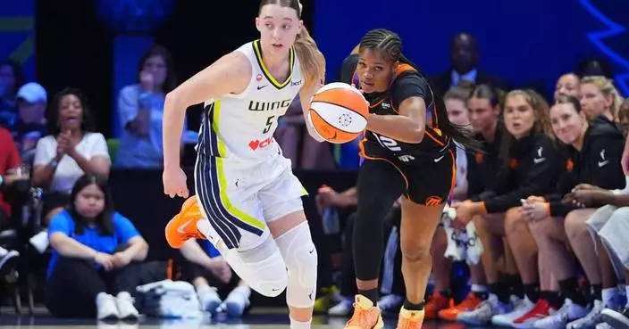 Bueckers scores 20 of her 26 in 1st half and the Wings beat the Mercury 87-82 for 6th straight win