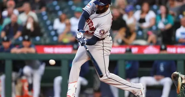 Alvarez hits 41st homer and drives in 3 as Astros blank Mariners 7-0 to tie Rangers atop AL West