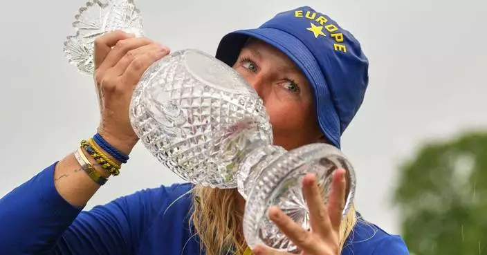 Europe beats US 15-13 in Solheim Cup. Lowry takes Irish Open by record 11 shots