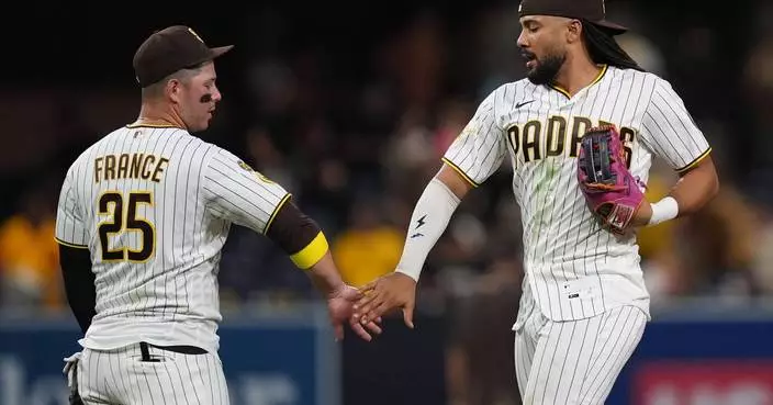 Machado and Campusano rally Padres past skidding Nationals 5-4 to keep pace in NL wild-card chase