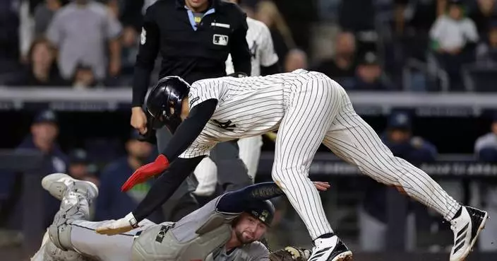 Lombard's incredible slide, tiebreaking homer lift Yanks over Rays. Schlitter finishes with 1.95 ERA