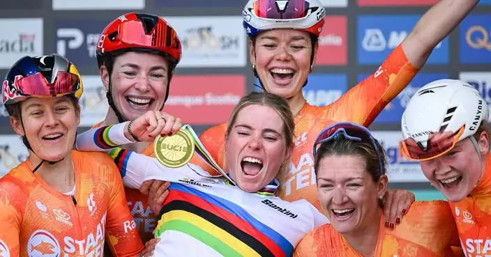 Demi Vollering wins world road cycling title in Montreal