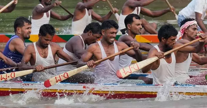 Photos of a boat race on India’s Kulsi River