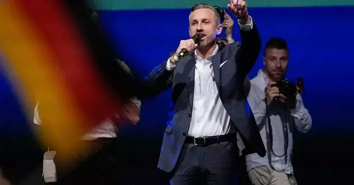 German chancellor faces tough times after first far-right party's state election win since Nazi era