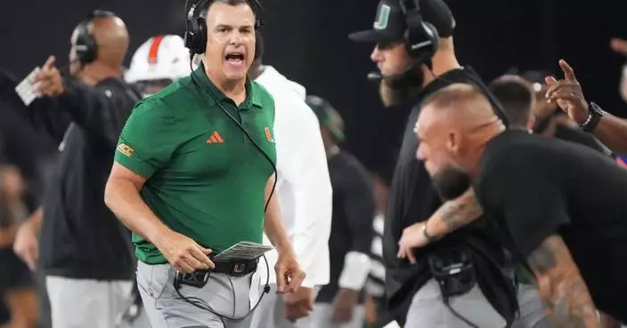 Mensah sets ACC consecutive-completions marks, defense rises in 4th as No. 5 Miami tops Wake Forest
