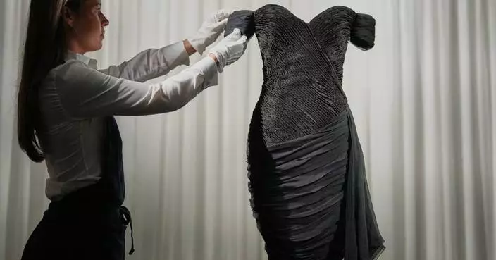 Back in black: Princess Diana's 'revenge dress' goes on show ahead of Sotheby's auction