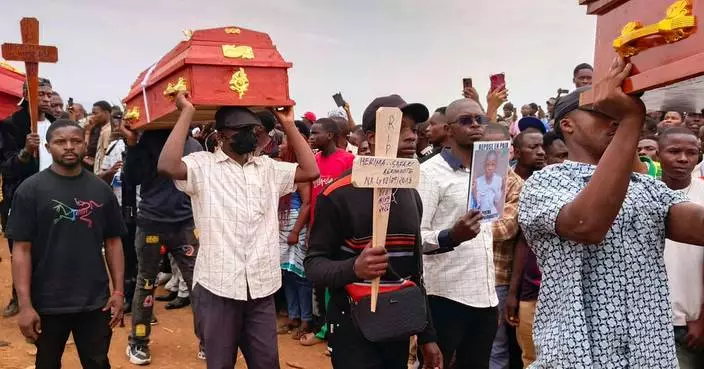 Hundreds gather in eastern Congo to mourn victims of school fires
