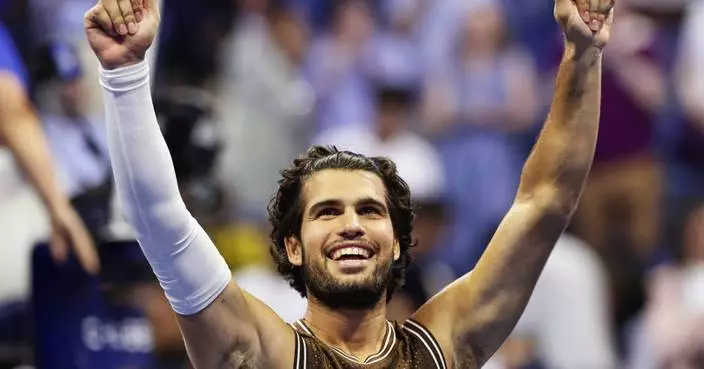 Carlos Alcaraz recovers after dropping the first set to reach the second round at the US Open