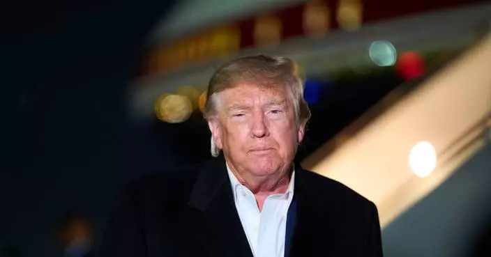The Latest: Trump pushing to keep red-state Senate seats in GOP hands