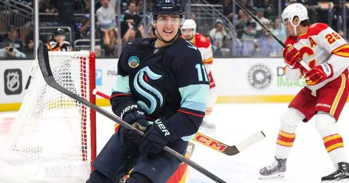 Samoskevich scores twice and Kraken beat Flames 6-1 in home opener as Calgary stays winless