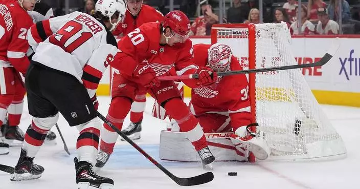 Jack Hughes scores on a breakaway in OT, lifts Devils to a 5-4 win over Red Wings