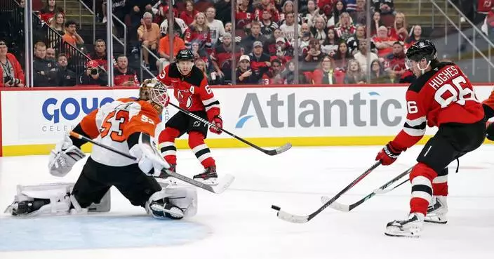 Olympic hero Jack Hughes scores in OT to lift the Devils over the Flyers 3-2