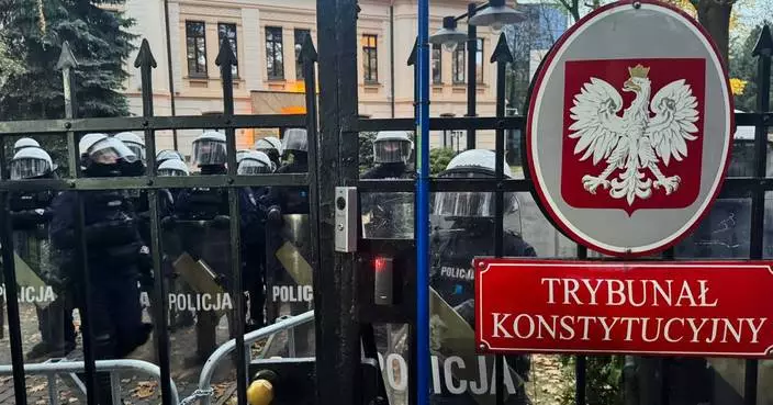 Police detain 3 protesters during overnight rally as Polish president backs suspended judge