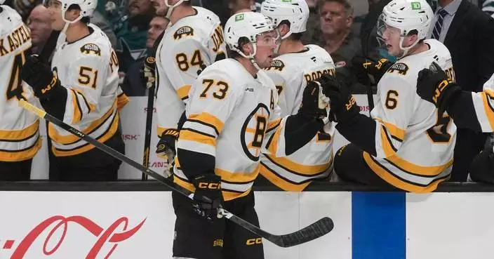 McAvoy scores in his 1st game back from a suspension to lead the Bruins past the Sharks 6-3