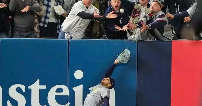 Fan interference denies Anthony Volpe a tying homer for Yankees against Rays in Game 3 of ALDS
