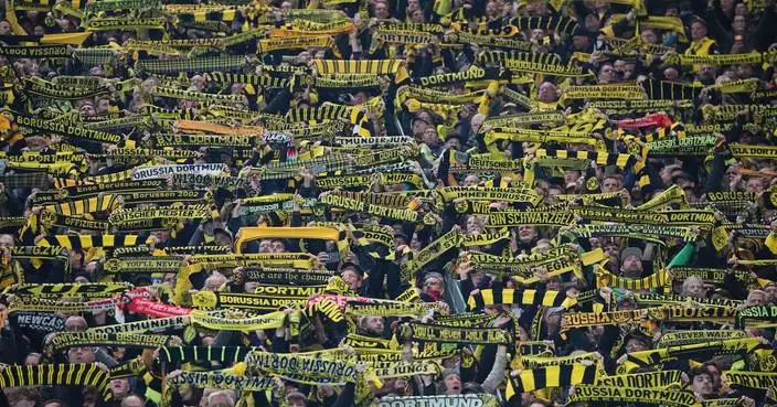 Stop the selfies! German soccer club rewards fans who avoid their phones during games