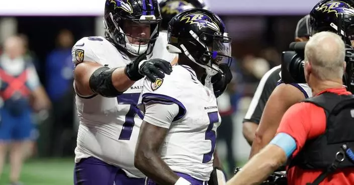 Huntley leads late TD drive to force OT and then scores on 1-yard run as Ravens beat Falcons 30-23