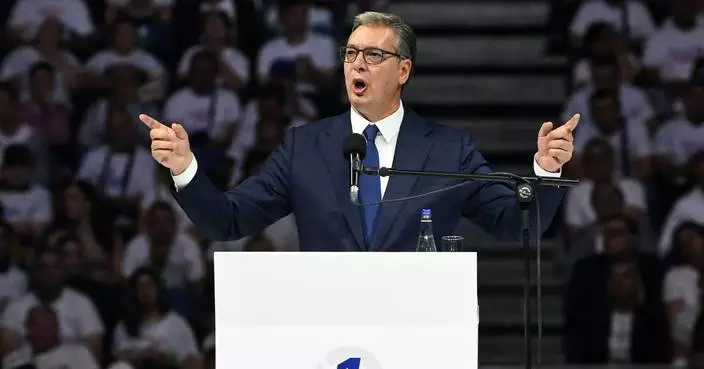 Thousands pack arena in Belgrade as Serbia's leader Vucic launches prime minister bid