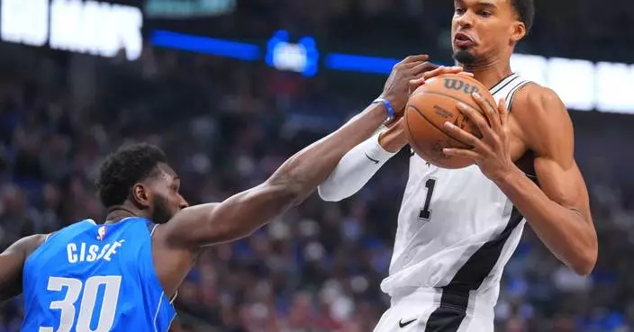 Wembanyama, Harper lead Spurs past short-handed Mavericks 122-106 for their first victory