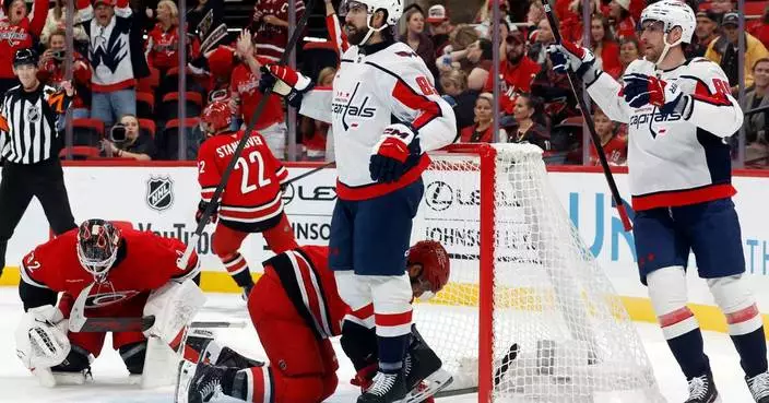 Tuch scores twice in his first game for Washington, helping the Capitals beat the Hurricanes 5-2
