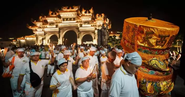 Photos show fire walking and incense burning at the Nine Emperor Gods Festival