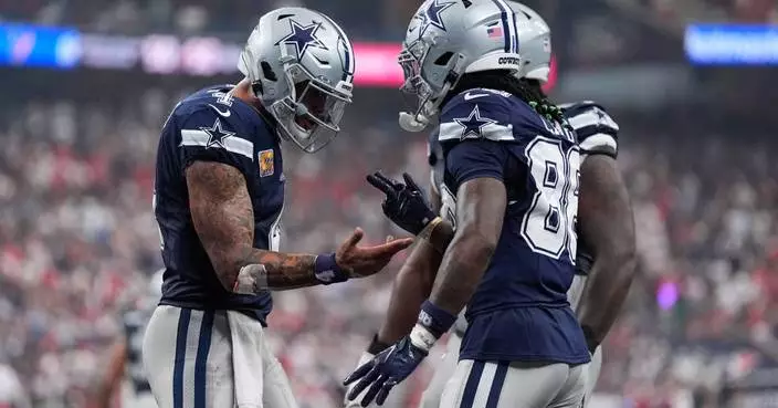 CeeDee Lamb’s late TD caps a wild Cowboys rally to beat winless Texans 34-30