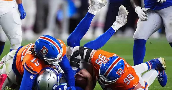 Sam Darnold gets hit 17 times by Broncos defense, takes ownership of miscues as Seahawks fall in OT