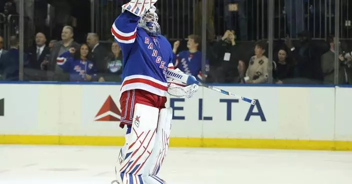 Igor Shesterkin becomes the 18th NHL goaltender to score a goal and first to do it for the Rangers